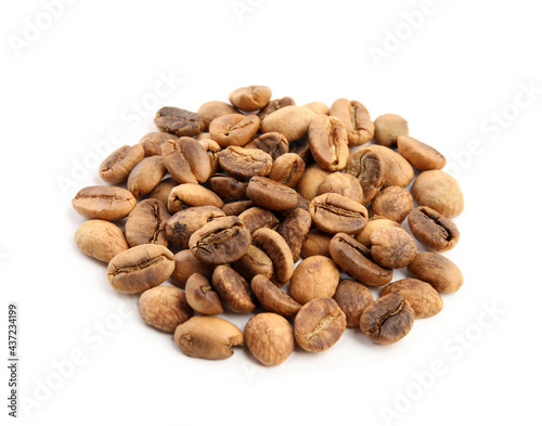 Heap of roasted coffee beans isolated on white