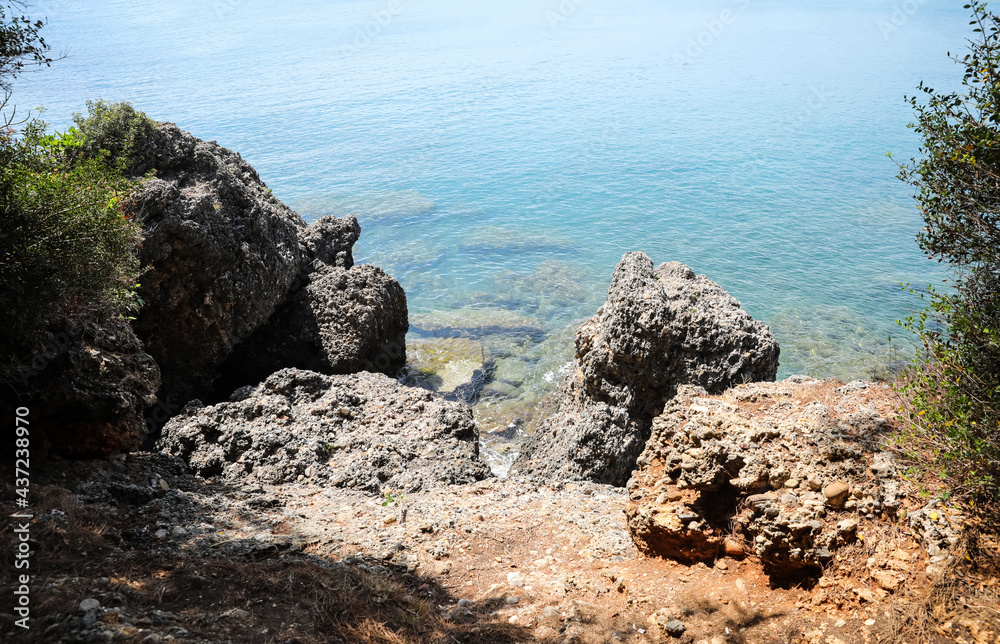 Beautiful view of rocky sea coast on sunny summer day Beautiful view of rocky sea coast on sunny summer day