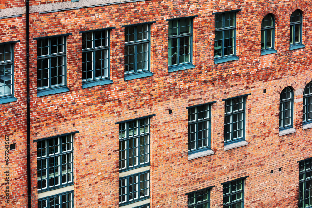 old brick office building with windows old brick office building with windows