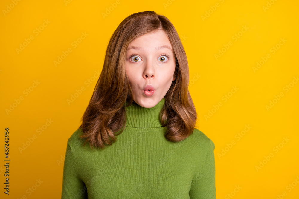 Photo portrait amazed girl stare in casual outfit isolated bright yellow color background Photo portrait amazed girl stare in casual outfit isolated bright yellow color background