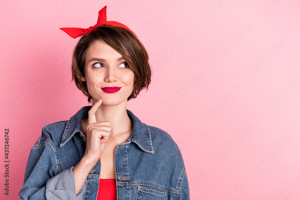 Photo of minded curious young woman look empty space think hold finger chin isolated on pink color background Photo of minded curious young woman look empty space think hold finger chin isolated on pink color background