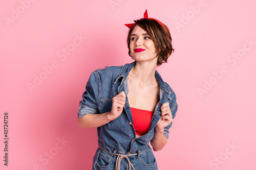 Portrait of attractive cheery cool girl posing having fun rock party chill isolated over pink pastel color background