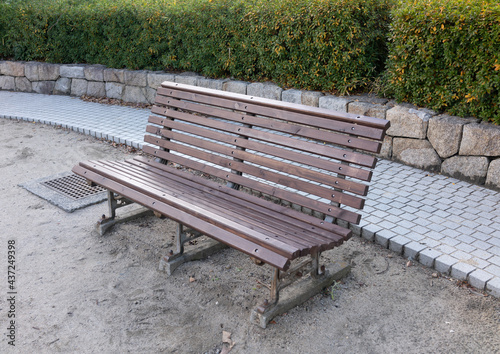 Obraz na płótnie Brown bench In the park