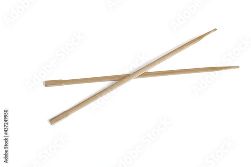 Wooden sticks, top view of stacked two wooden sticks on isolated white background.