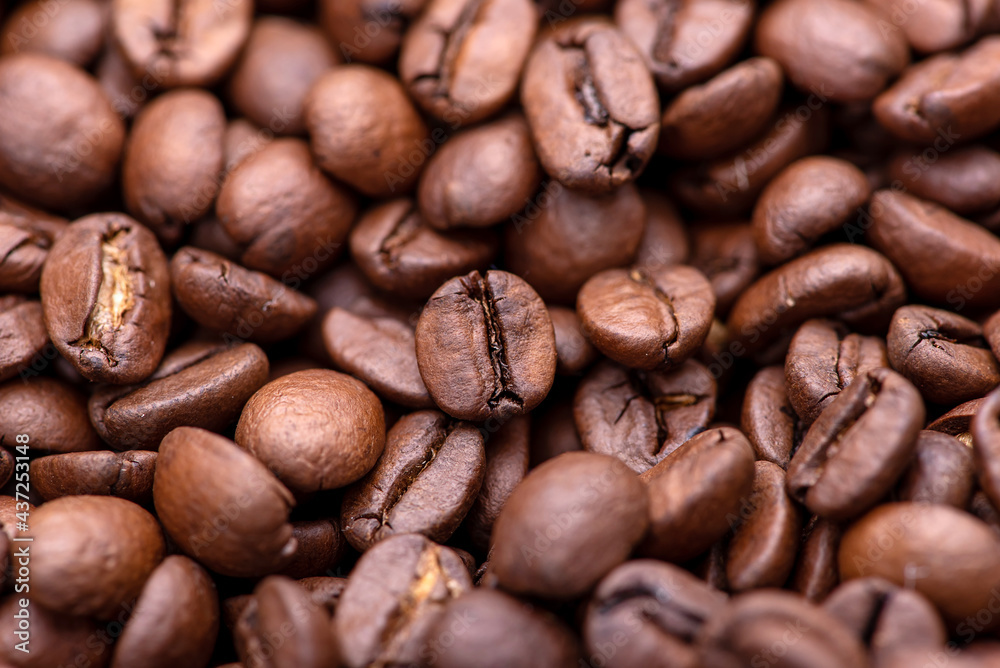 Roasted coffee beans. Background and macro Roasted coffee beans. Background and macro