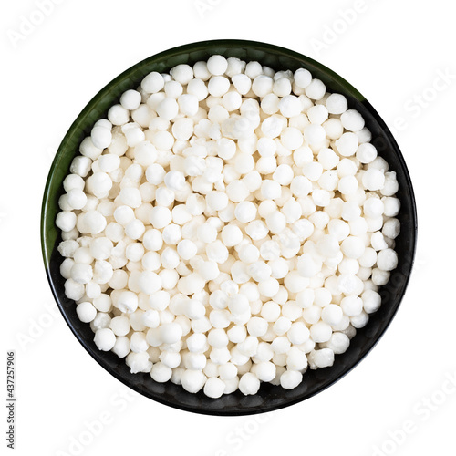 dry sabudana (tapioca sago) in round bowl isolated photo