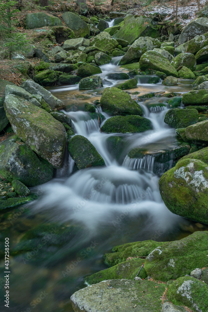 Small creek in Krkonose national park in spring with snow Small creek in Krkonose national park in spring with snow