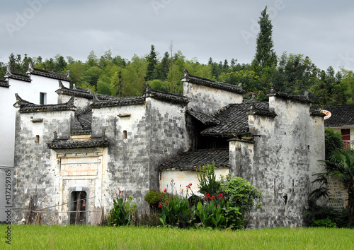Sixi Yancun in Wuyuan County  Jiangxi Province  China. Sixi Yancun is an ancient town in Wuyuan County which is known for its Tang Dynasty architecture. Traditional village buildings with fields.