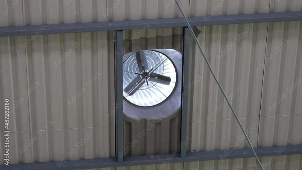 Roof ventilation fan in the bottom view. Metal ventilator turbines on