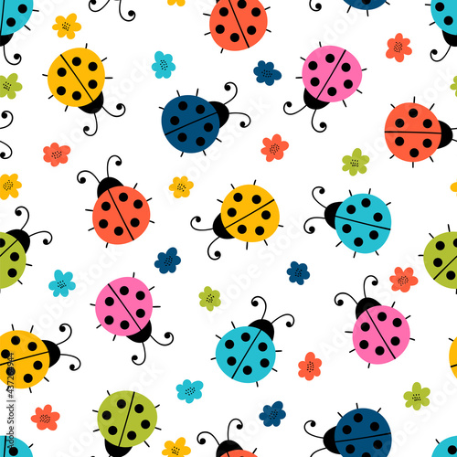 Hand drawn seamless pattern with cute ladybugs and flowers. Simple graphic design. Scandinavian style. Lovely background