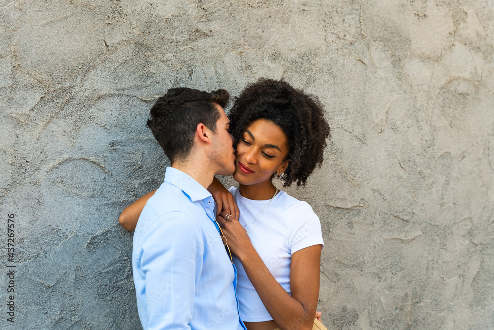 Young romantic couple having embracing fun time in the city. Young romantic couple having embracing fun time in the city.