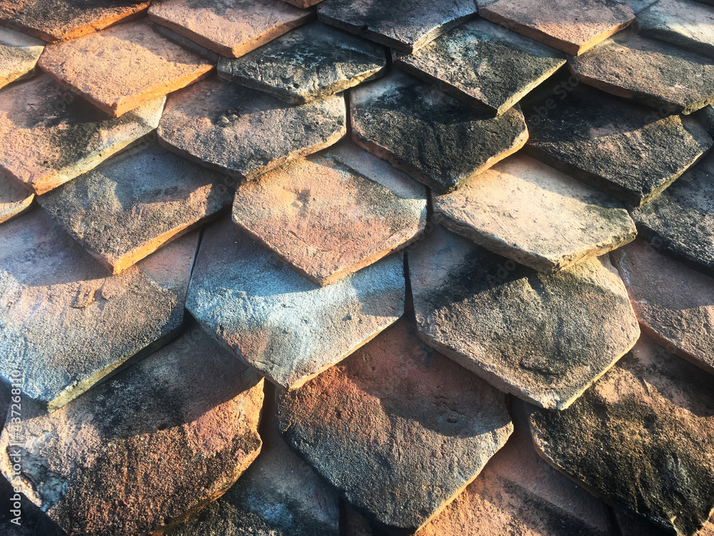 Old red brick roof tiles from north of thailand Old red brick roof tiles from north of thailand