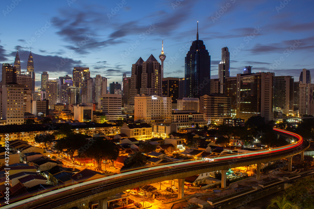 Fototapeta premium Kuala Lumpur,Malaysia ,May circa 2021: A magnificent view of kuala lumpur skyline during sunrise