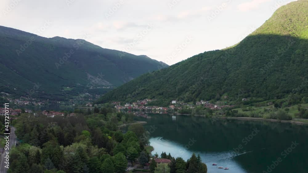 Drone flying over Lake Endine with the mountains in the background,Lombardy,Italy. Drone flying over Lake Endine with the mountains in the background,Lombardy,Italy.
