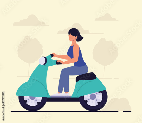 woman rides a scooter