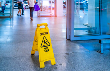 "Caution wet floor" sign in mall