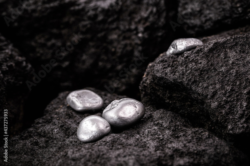 silver stones in mine, mineral extraction concept