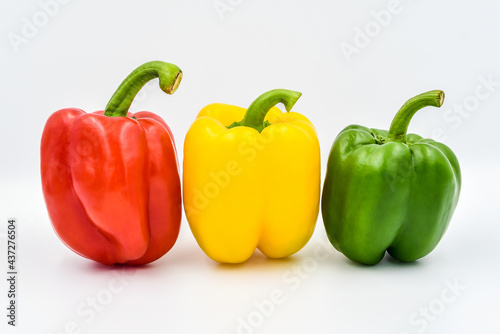 Fresh sweet pepper (red , yellow, and green) on white background