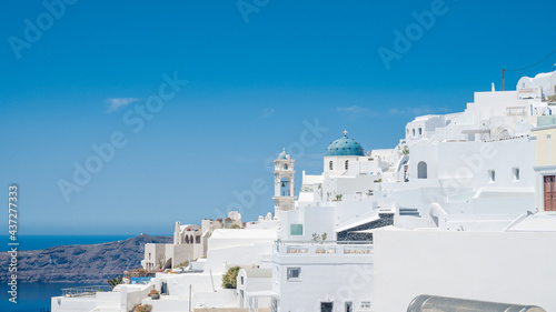 Scenic cityscape of Imerovigli. city on the hill. White architecture. Santorini island, Greece. Luxury tourism.