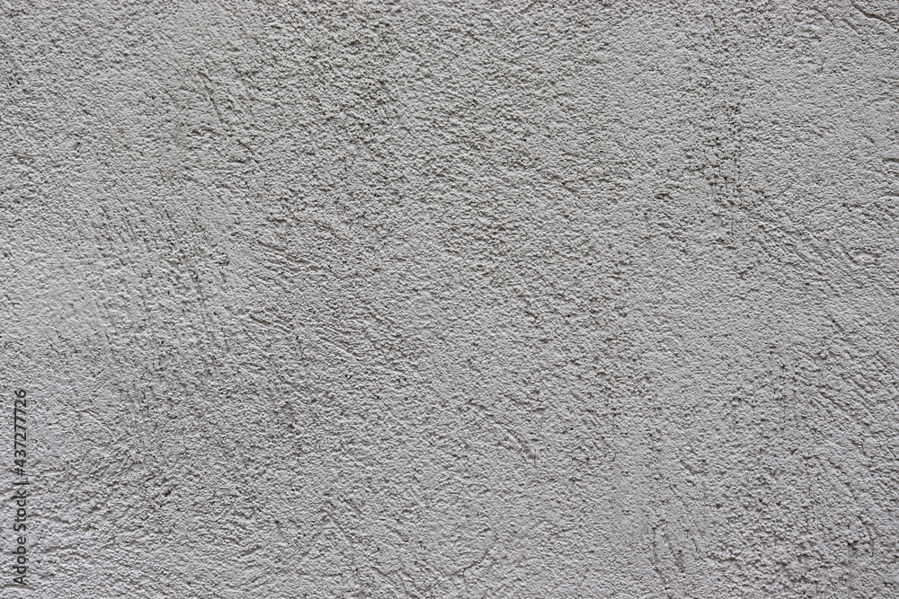 Gray texture background. Concrete wall. Rough surface. Stone texture. Uneven, scratched, lumpy. Gray texture background. Concrete wall. Rough surface. Stone texture. Uneven, scratched, lumpy.