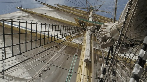 Mast with sails and shrouds on old sail ship - windjammer, bark