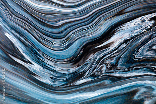 Fluid art texture. Backdrop with abstract swirling paint effect. Liquid acrylic picture with trendy mixed paints. Can be used for website background. Black, blue and white overflowing colors. © Mirror Flow