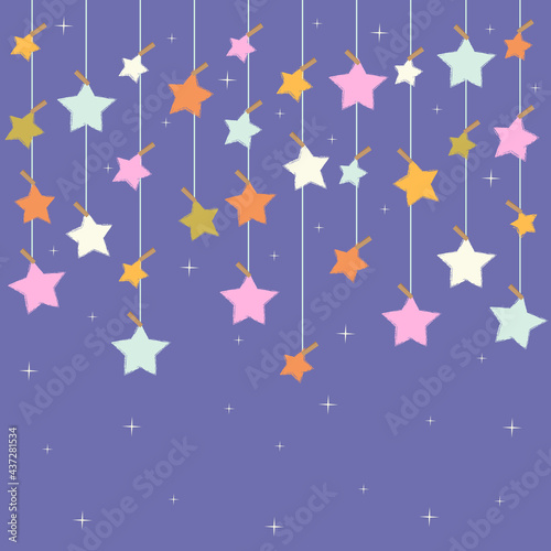 Stars garlands attached with clothespins to a rope on a blue background