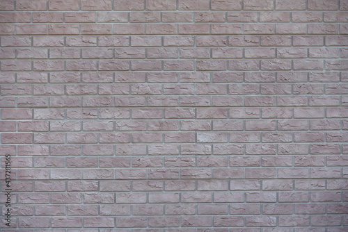 Texture brick wall from plastic panels for facade decoration