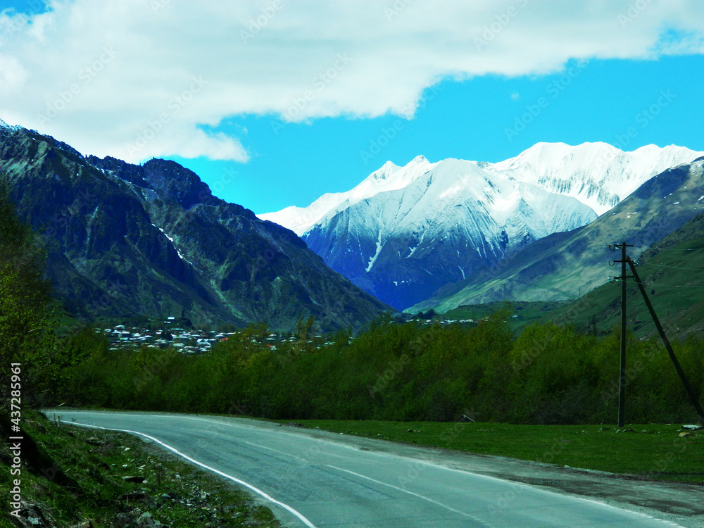 road against the background of high mountains