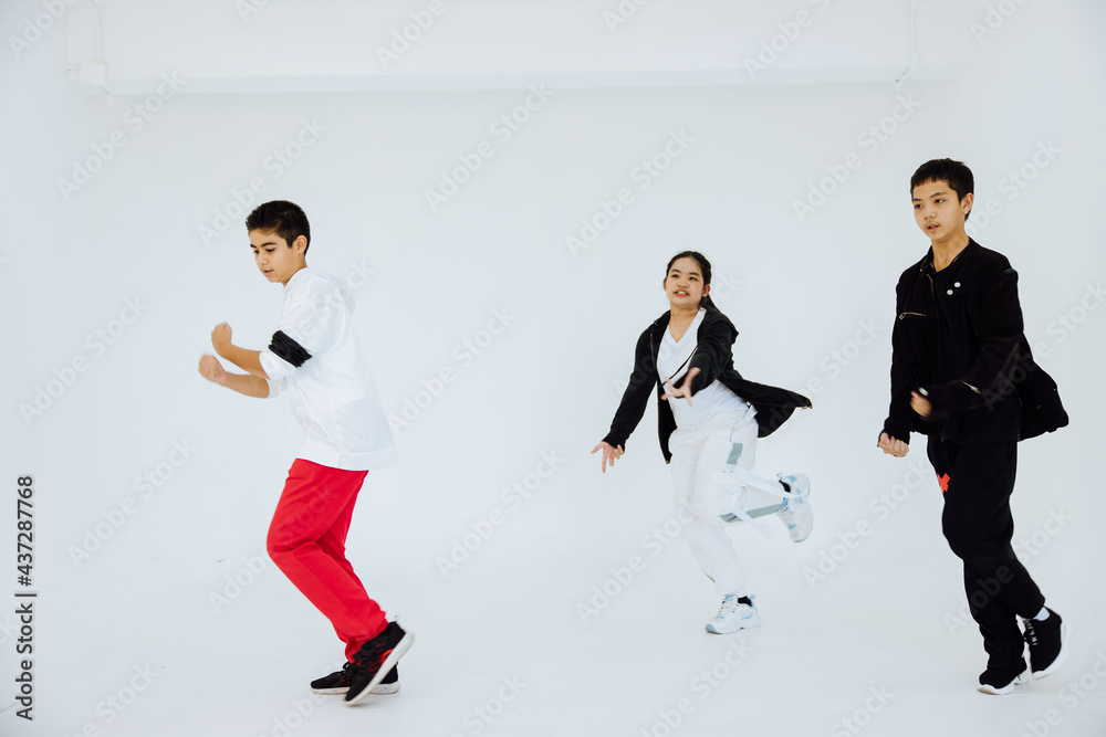 Fototapeta premium Elementary School Movement Dancer Lessons, Performance Dance Dance Classroom, Fun Group Workout Friendship in White Studio.