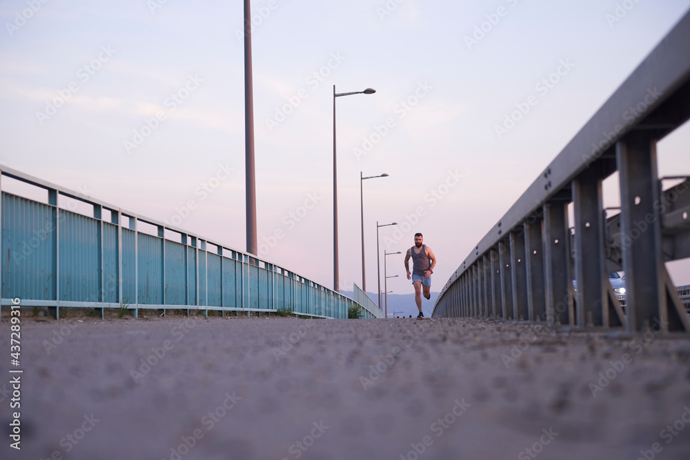 A person running on the bridge