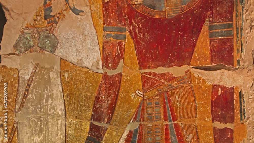 Stone wall with ancient Egyptian pharaoh fresco
