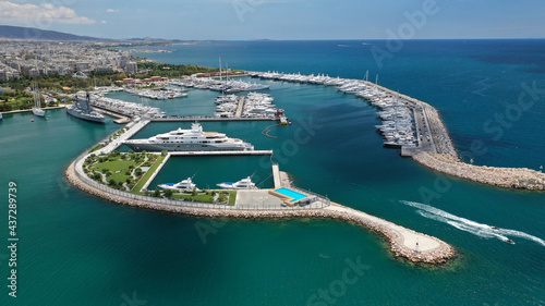 Aerial drone photo of luxury yachts and sail boats anchored in famous port and marina of Faliro or Phaleron in South Athens riviera, Attica, Greece photo