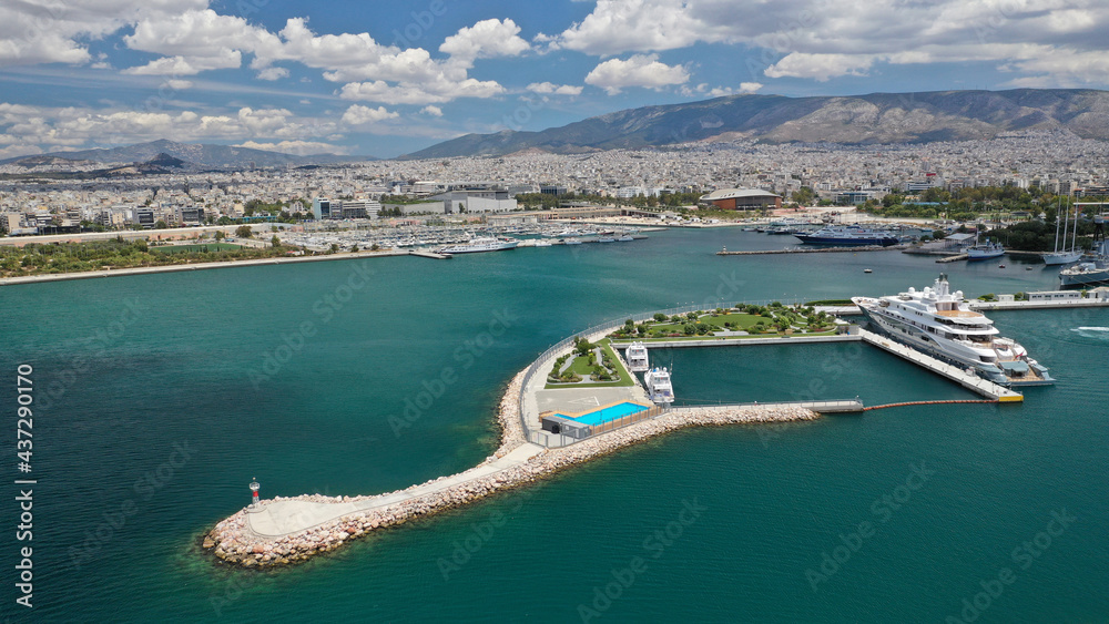 Fototapeta premium Aerial drone photo of luxury yachts and sail boats anchored in famous port and marina of Faliro or Phaleron in South Athens riviera, Attica, Greece