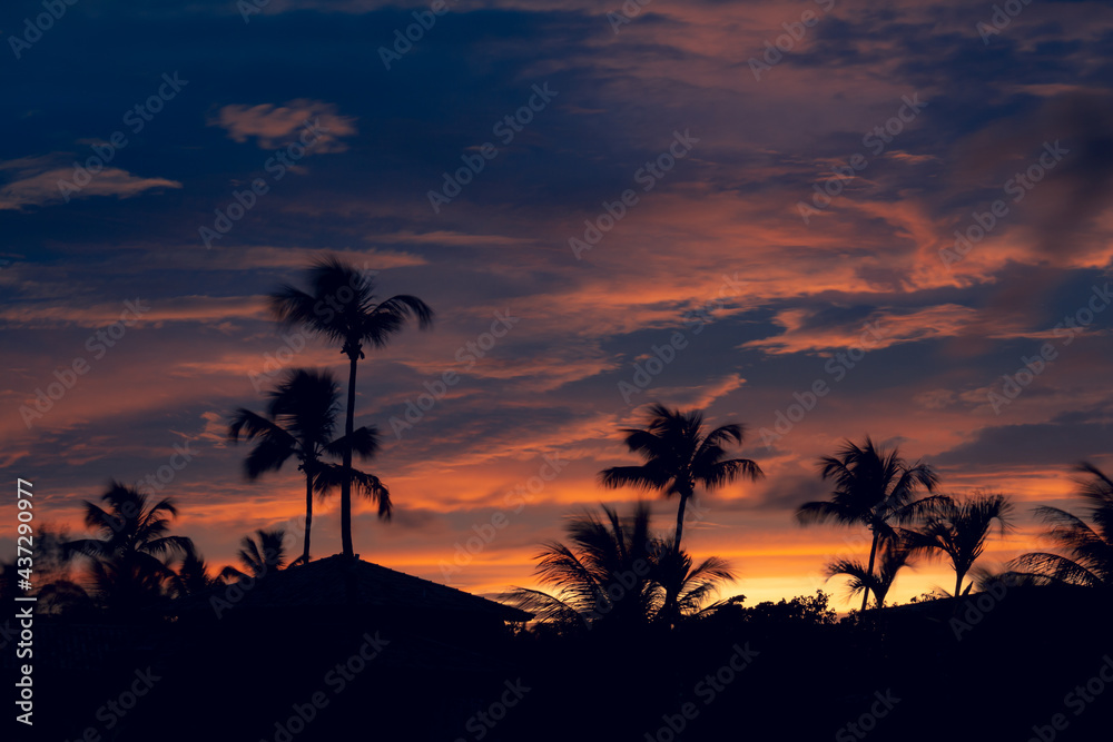 Shocking sunset with the sky full of colorful clouds. Concept of tranquility on vacation and Enjoy nature.