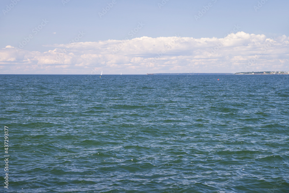 photo of small waves on the sea