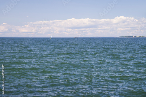 photo of small waves on the sea