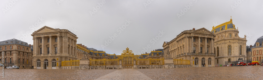 Versailles, France - 19 05 2021: Castle of Versailles. View of the Honor Grid and facade of the Castle of Versailles from the Weapons Square