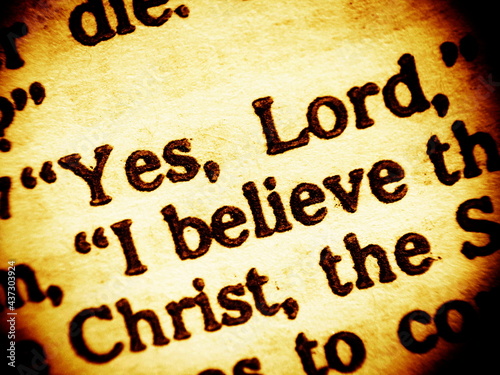 Confession of faith. Close up view on a part biblical text saying Yes, Lord, I believe - a confession of Martha (sister of Lazarus) to Jesus Christ. Bible, the Gospel of John chapter 11, verse 27. 
