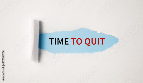 time to quit, text on white paper on torn paper background. business and . retirement concept.