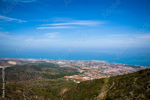 Benalmádena teleferico shot from the top of Calamorro with city and coastline in the background. Andalusia, Spain. photo