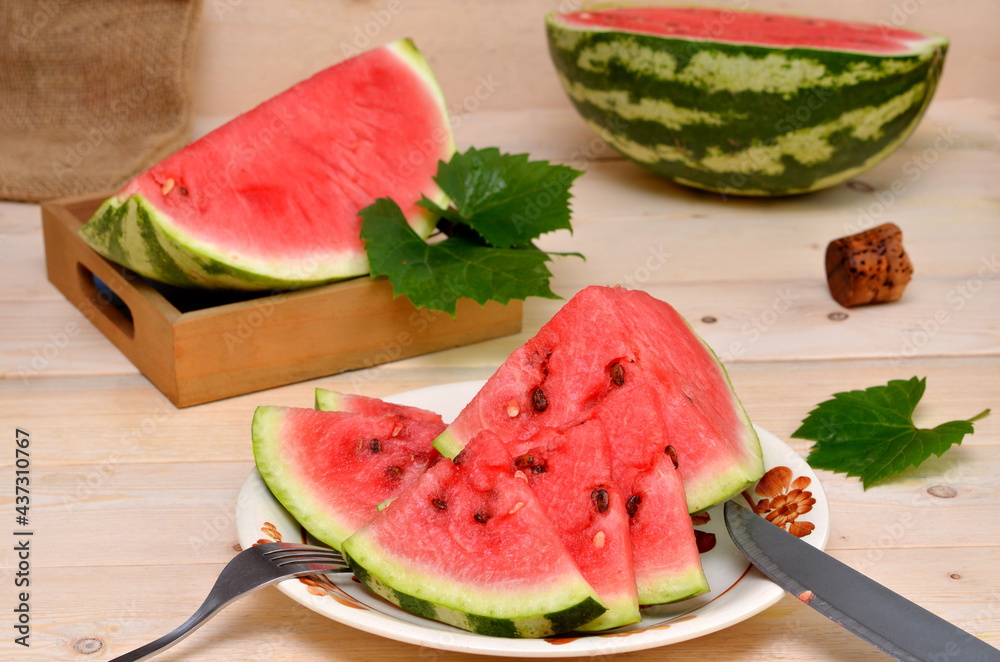 still life with sliced watermelon in a rustic style still life with sliced watermelon in a rustic style