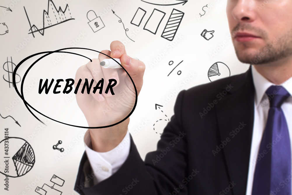 Business, technology, internet and network concept. Young businessman thinks over the steps for successful growth: Webinar Business, technology, internet and network concept. Young businessman thinks over the steps for successful growth: Webinar