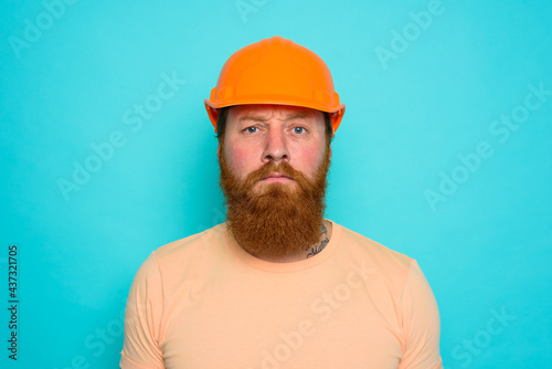 Wallpaper Mural Worker with yellow hat is confused about his work Torontodigital.ca