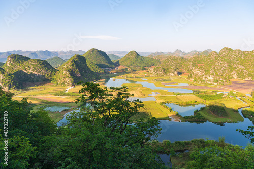 Sunny morning scenery in Puzhehei, Yunnan, China photo