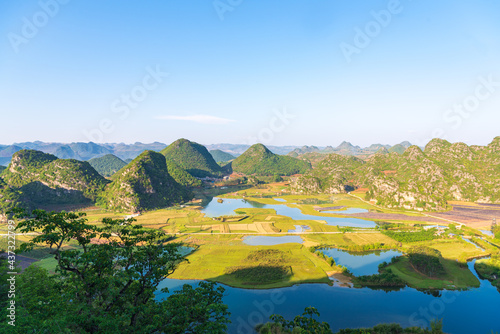 Sunny morning scenery in Puzhehei, Yunnan, China photo