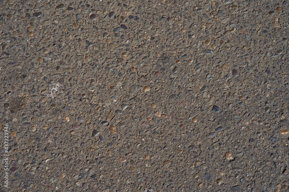 Texture of cement and compact asphalt. Gray and black color. Background for designs Texture of cement and compact asphalt. Gray and black color. Background for designs