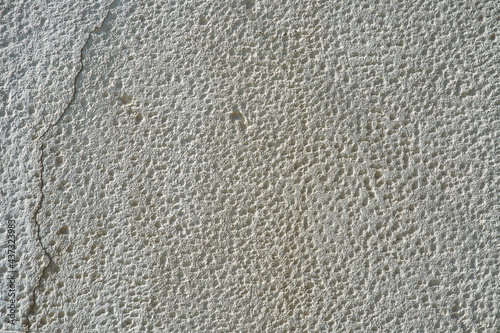 Texture of salt orifices. White color. Background for designs