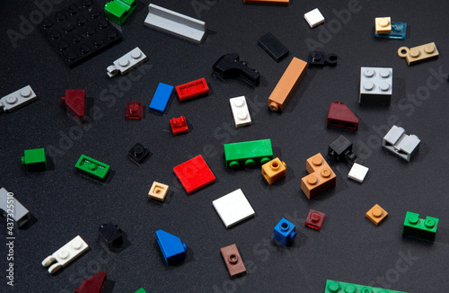 Plastic parts of the designer on a black background