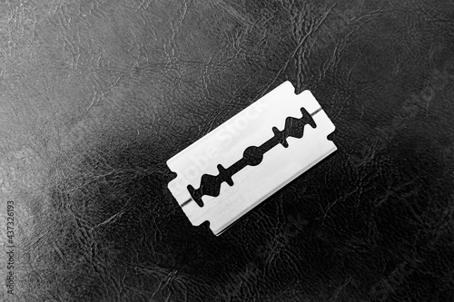 Obraz na plátně stainless steel blade isolated on textured background
